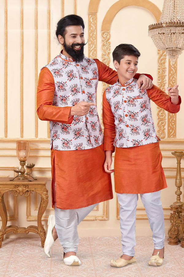 Angasudha Father-Son Matching Rust Orange Kurta Set with White Floral Nehru Jacket